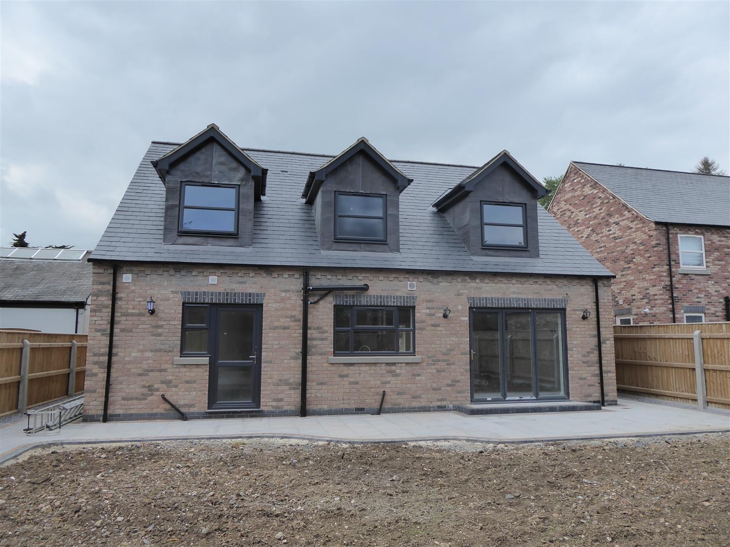 REAR ELEVATION PHOTO